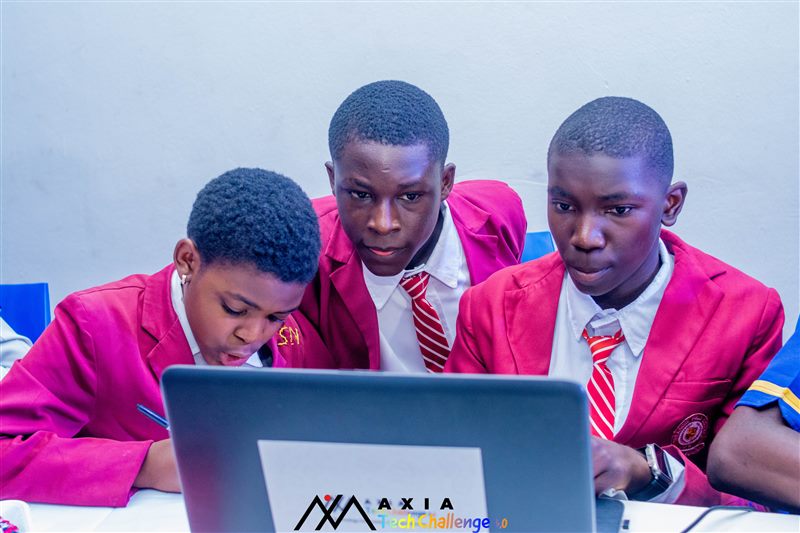 Participants networking and collaborating at Axia Tech Challenge
