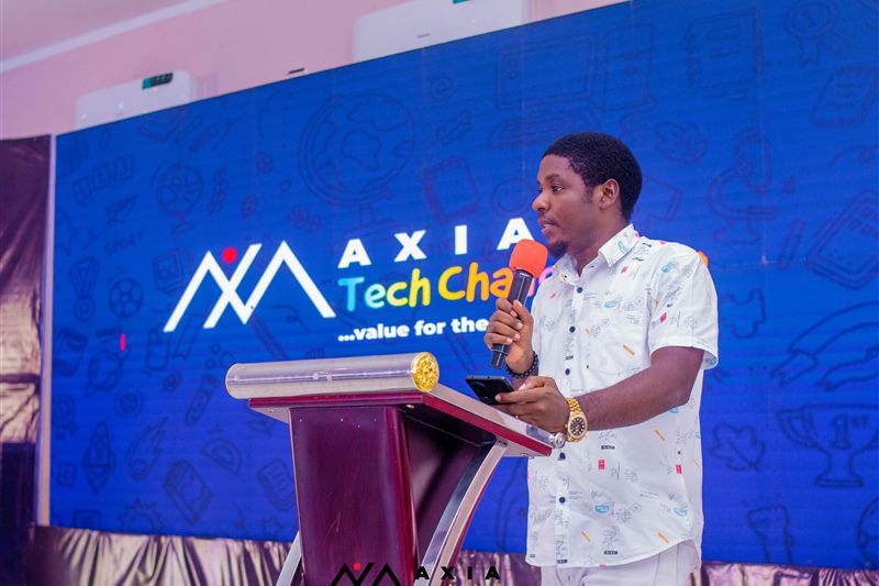Keynote speaker addressing Axia Tech Challenge audience